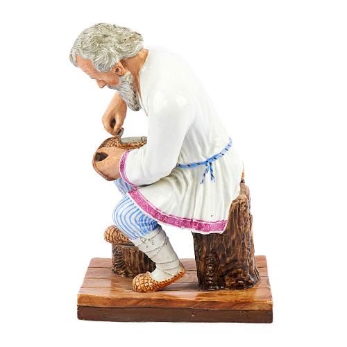 Скульптурная композиция "Крестьянин плетущий лапти"