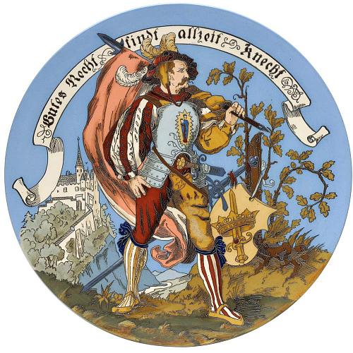 Декоративные парные тарелки с воинами в средневековых костюмах и геральдическими щитами.